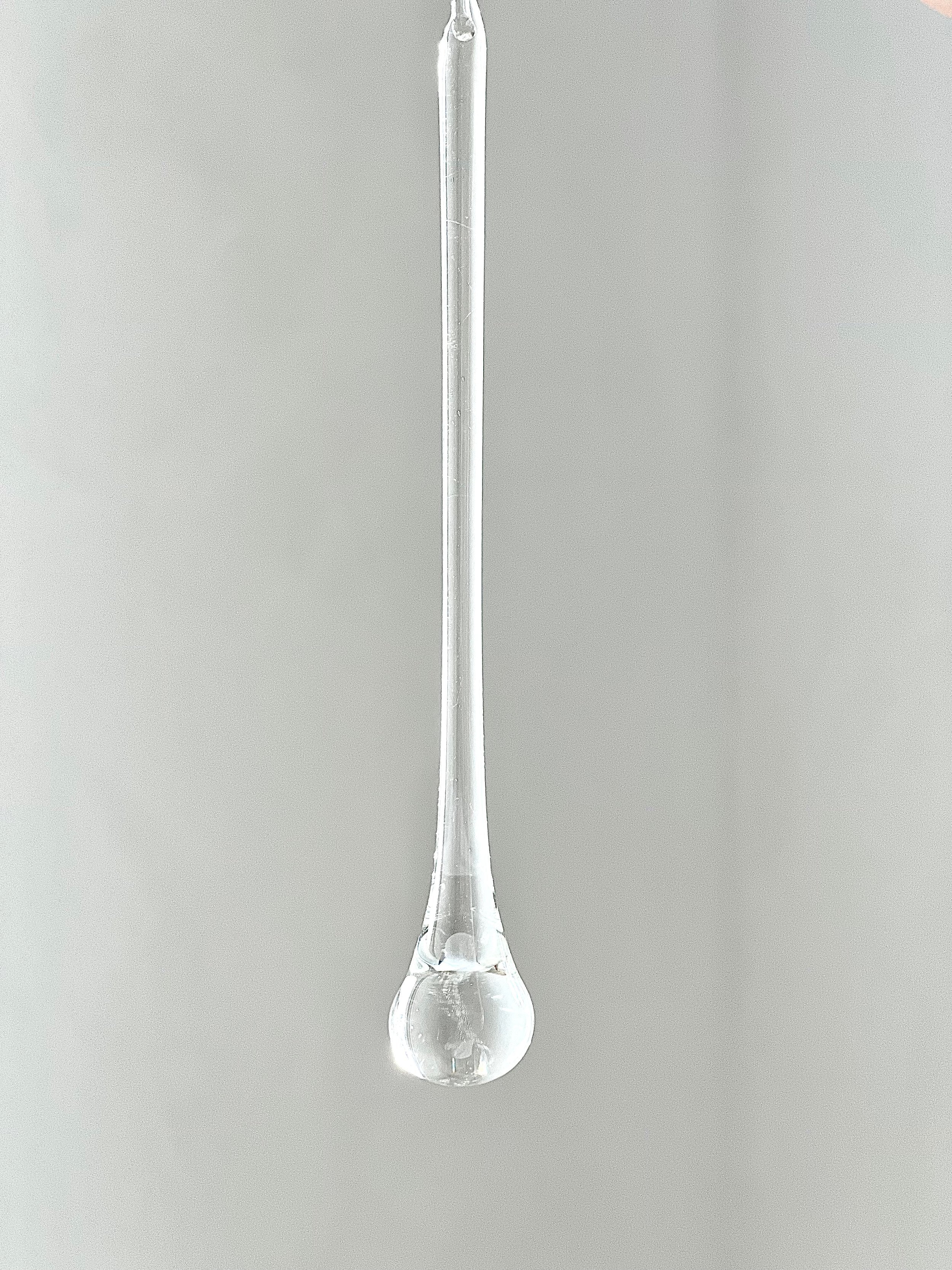 Tear drop shaped, organically hand blown glass icicles. 