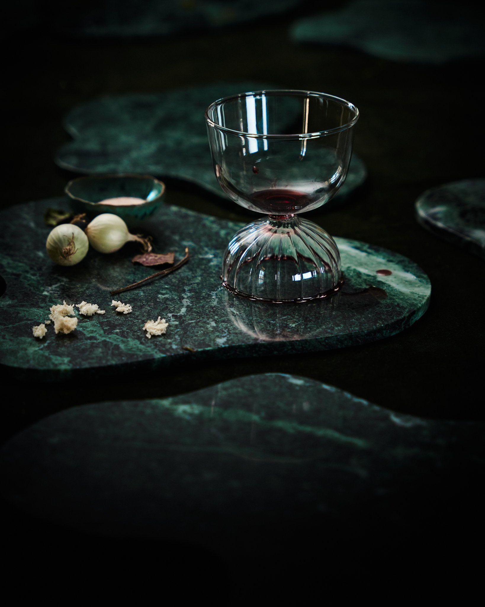 Organically shaped green Italian marble slabs