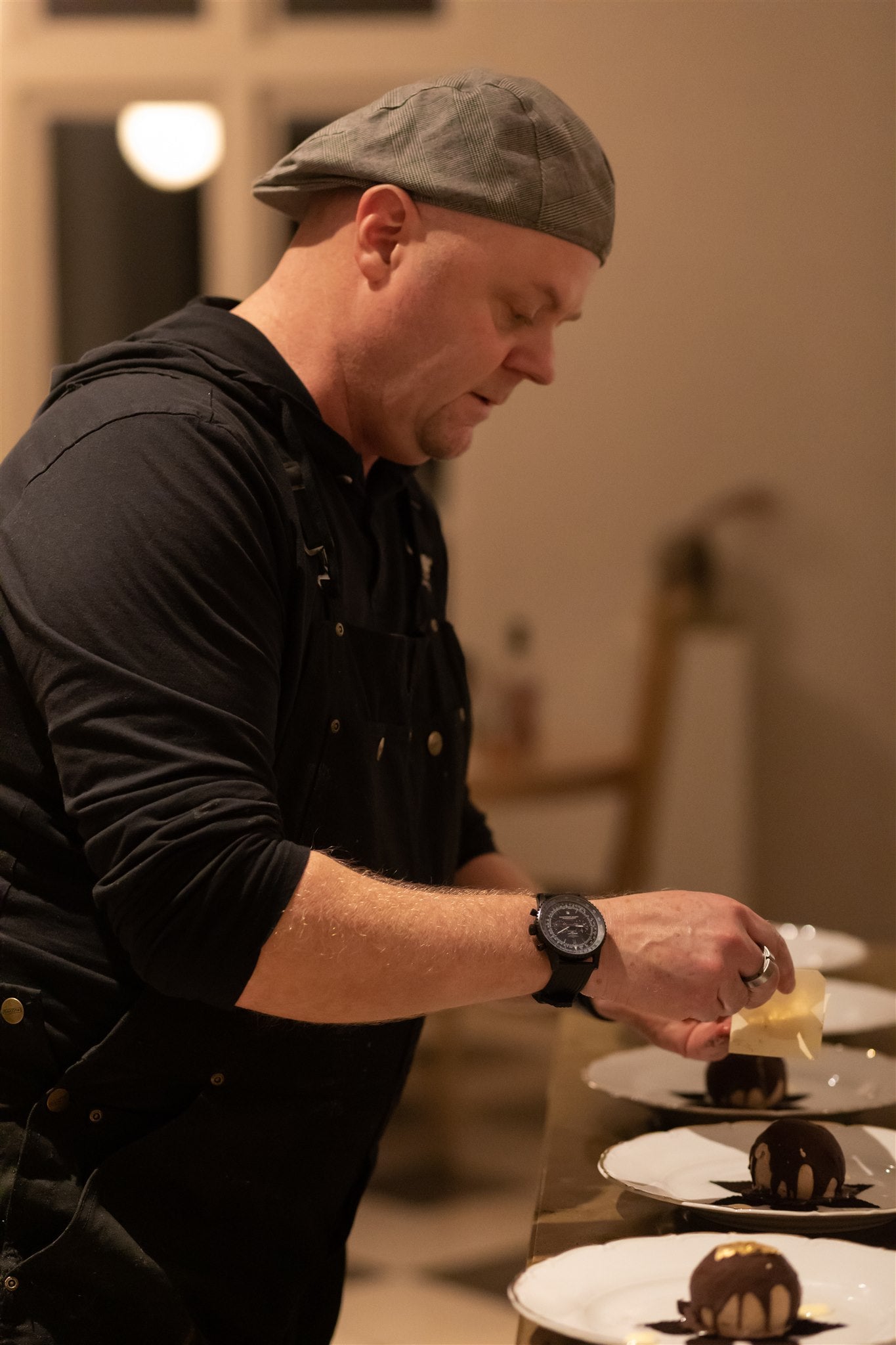 chef Mathew McIntyre preparing dessert in the kitchen