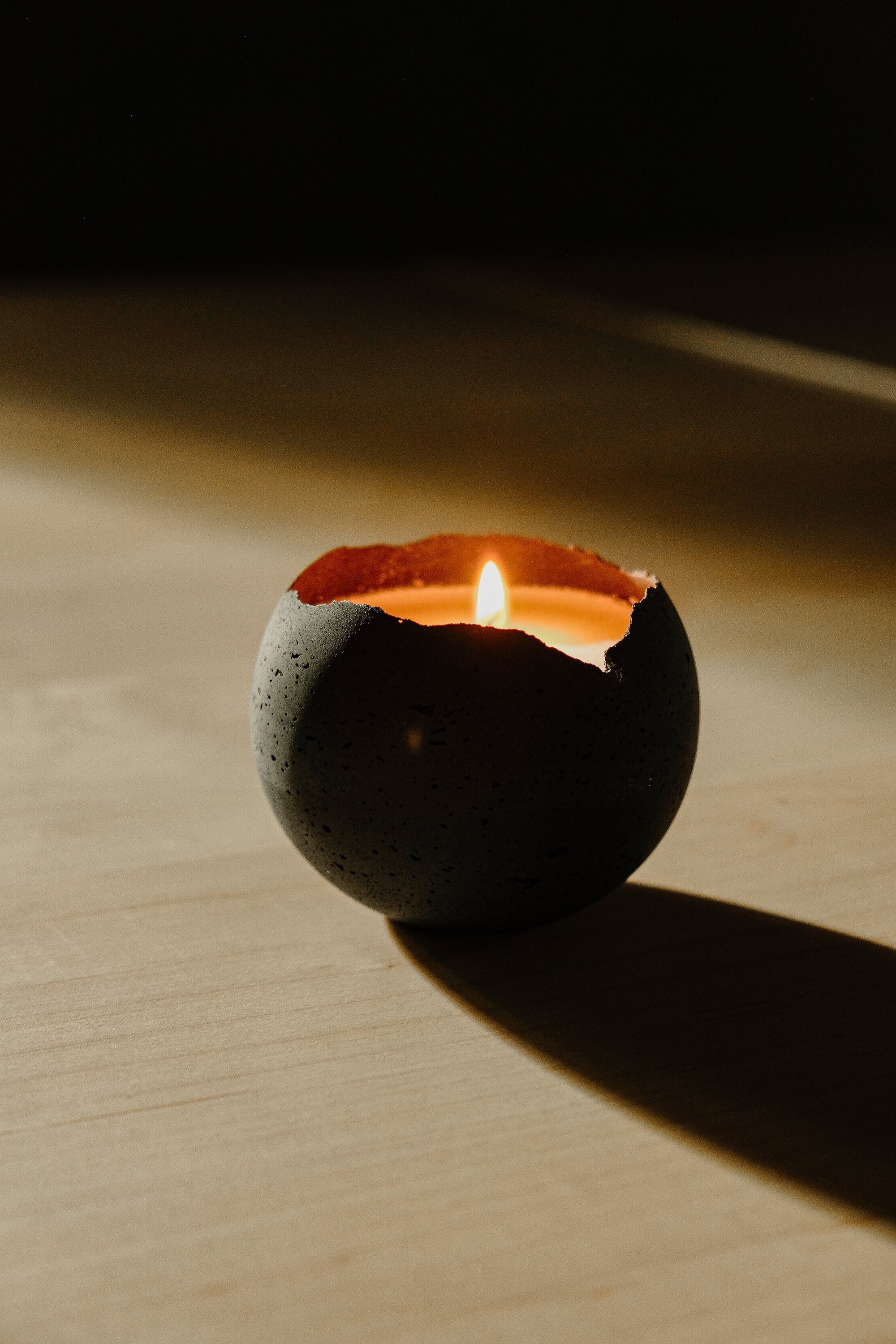 concrete moon shaped candle