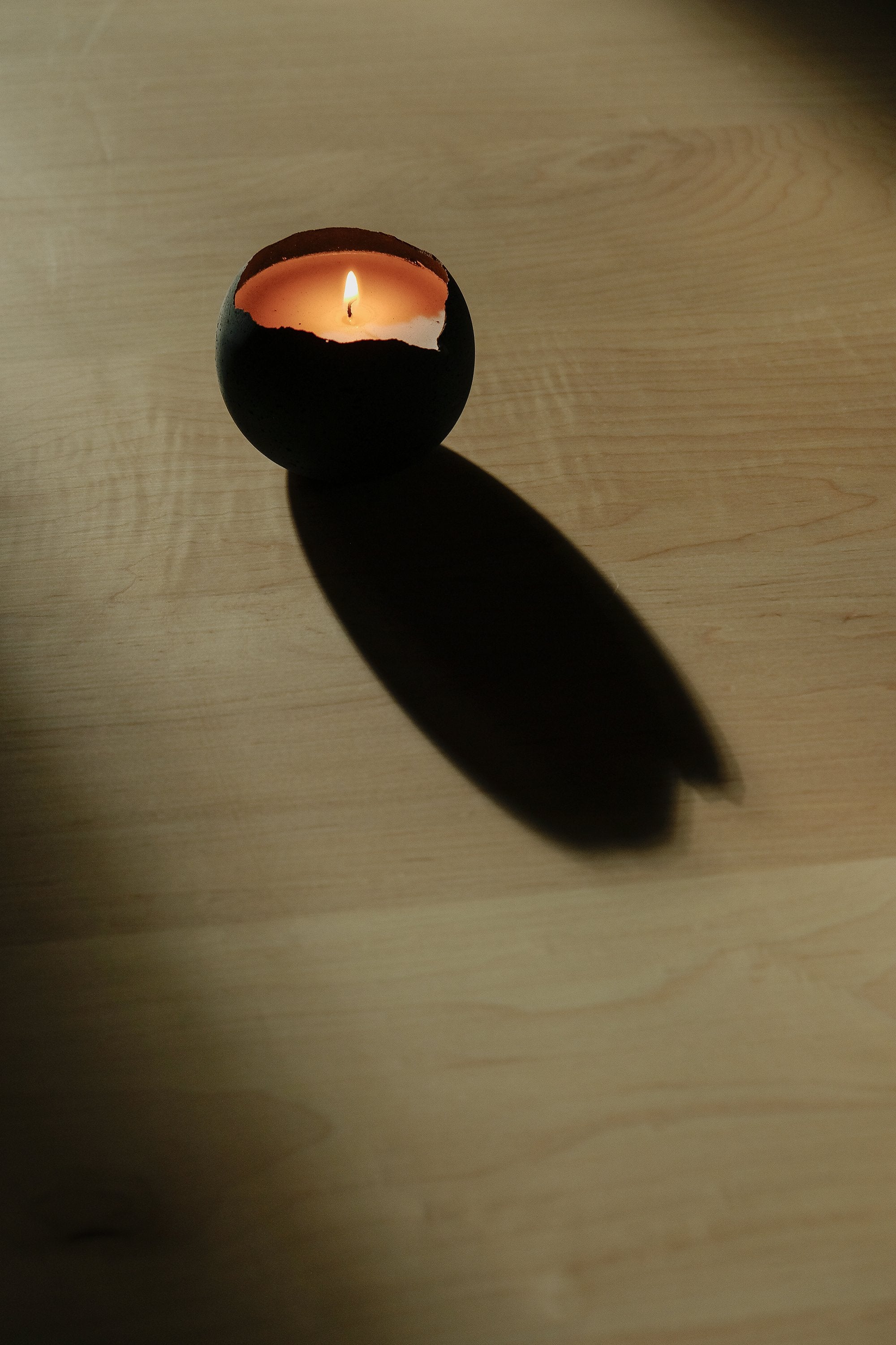 concrete moon shaped candle