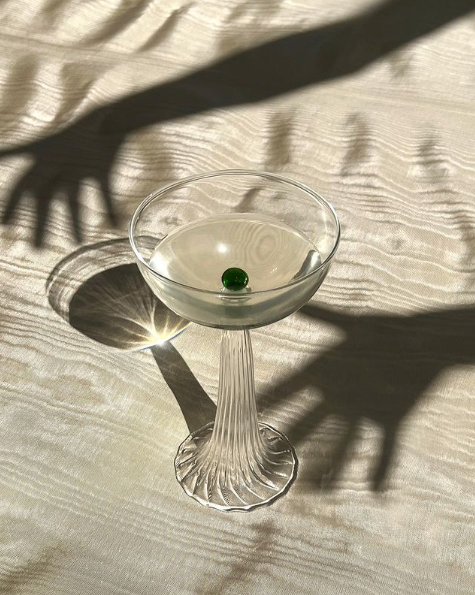 coupe glass with green glass detail