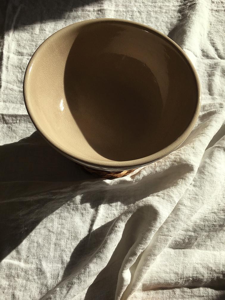 ceramic bowl on white linen