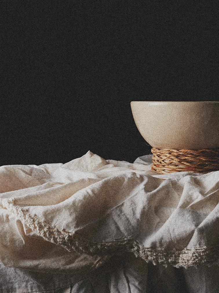 ceramic bowl on white linen