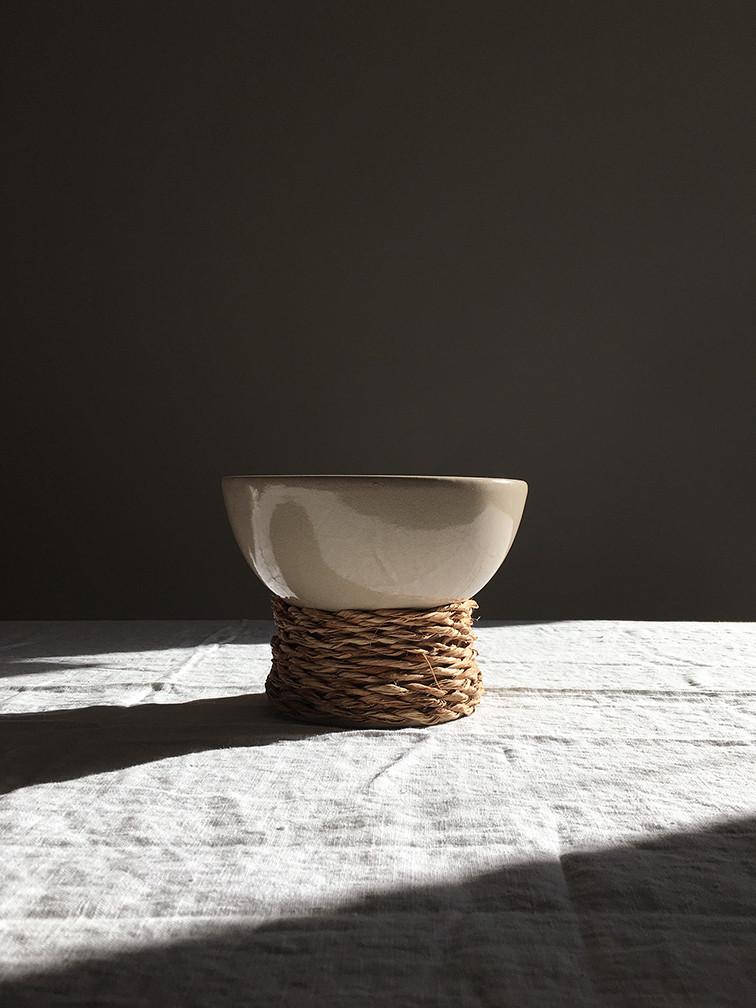 ceramic bowl on white linen